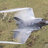 Buy canvas prints of USAF F35 A  flying out of low level by Rory Trappe