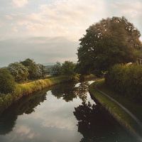 Buy canvas prints of  The Canal at Dawn.  by Irene Burdell