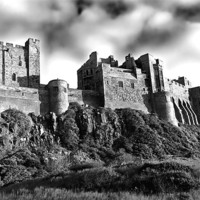 Buy canvas prints of Bamburgh Castle B&W by Kevin Tate