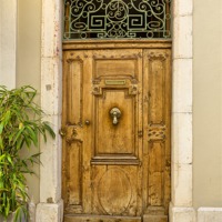 Buy canvas prints of Old wooden door by Kevin Tate