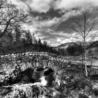 Buy canvas prints of Ashness Bridge towards Skidaw by Kevin Tate