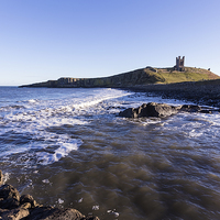Buy canvas prints of Dunstanburgh Castle by Kevin Tate