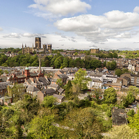 Buy canvas prints of Durham Cathedral above the city by Kevin Tate