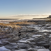Buy canvas prints of Bamburgh Rocks by Kevin Tate