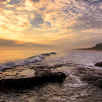 Buy canvas prints of Bamburgh Sunrise Panaromic by Northeast Images