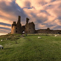 Buy canvas prints of Dunstanburgh Castle by Northeast Images