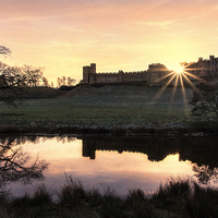 Buy canvas prints of  Alnwick Castle Sunset by Northeast Images