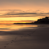 Buy canvas prints of  Bamburgh - Footprints by Northeast Images
