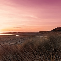 Buy canvas prints of Bamburgh Red Sky by Northeast Images
