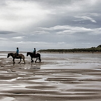 Buy canvas prints of Bamburgh Beach and Horses by Northeast Images