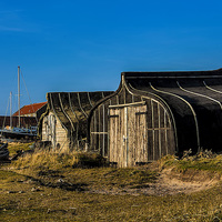 Buy canvas prints of Lindisfarne Boat Sheds by Trevor Kersley RIP