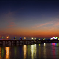 Buy canvas prints of North Pier At Sunset by Jason Connolly