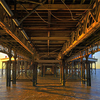 Buy canvas prints of Below The Pier by Jason Connolly