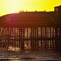 Buy canvas prints of North Pier Sunset by Jason Connolly