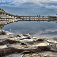 Buy canvas prints of Blackpool Beach Reflections. by Jason Connolly