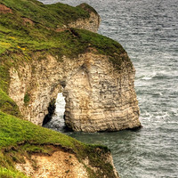 Buy canvas prints of An Arch at Flamborough Head by Tom Gomez