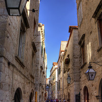 Buy canvas prints of An Alley in Dubrovnik by Tom Gomez