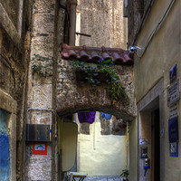 Buy canvas prints of An Alleyway in Old Split by Tom Gomez