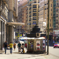 Buy canvas prints of Newspaper Stand on the Gran Via by Tom Gomez