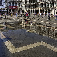 Buy canvas prints of Reflections in Piazza San Marco by Tom Gomez