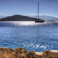 Buy canvas prints of Yacht in front of Nissaki by Tom Gomez