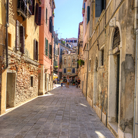 Buy canvas prints of An Alleyway in Venice by Tom Gomez