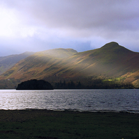 Buy canvas prints of Sunlight over Derwentwater by Tom Gomez