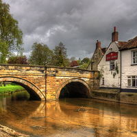 Buy canvas prints of The Rose at Pickering Bridge by Tom Gomez