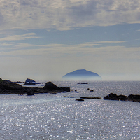 Buy canvas prints of Ailsa Craig in Mist by Tom Gomez
