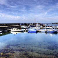 Buy canvas prints of Maidens Harbour by Tom Gomez