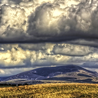 Buy canvas prints of Clouds over Tinto by Tom Gomez