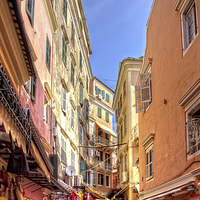Buy canvas prints of Busy Corfu Alley by Tom Gomez