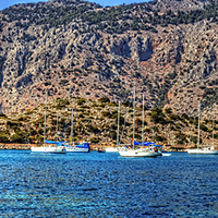 Buy canvas prints of Yachts at Panormitis by Tom Gomez
