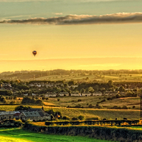 Buy canvas prints of Hot Air Balloons at Twilight by Tom Gomez