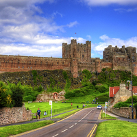 Buy canvas prints of Bamburgh Castle by Tom Gomez