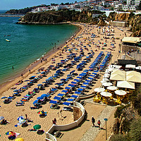 Buy canvas prints of Albufeira Beach (west end) by Tom Gomez