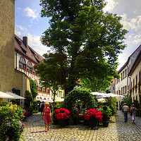 Buy canvas prints of Regensburg Courtyard by Tom Gomez