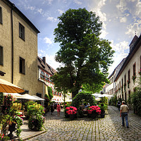 Buy canvas prints of Cobbled Regensburg Courtyard by Tom Gomez