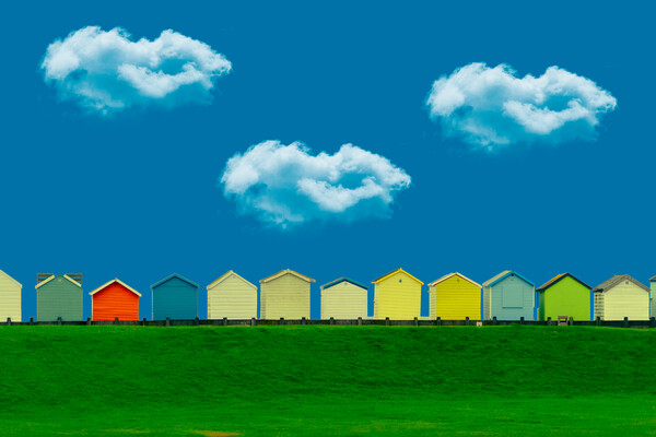 Beach Huts And Clouds Picture Board by Chris Lord