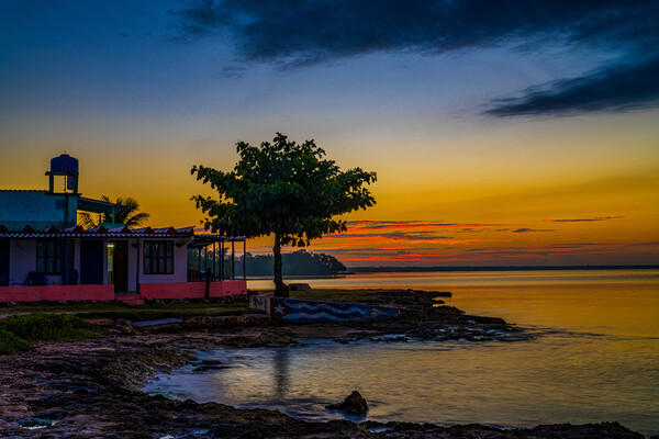 Golden Hour At Playa Larga Picture Board by Chris Lord