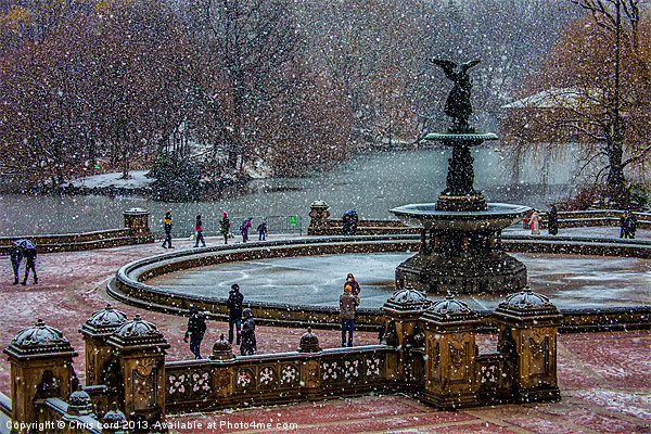 Snow falls on Bethesda Terrace Picture Board by Chris Lord