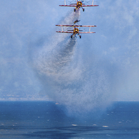 Buy canvas prints of Stearman Biplanes At Eastbourne by Chris Lord