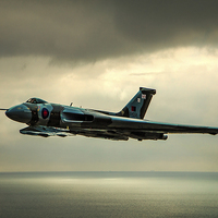 Buy canvas prints of   Vulcan XH558 Over The Sea by Chris Lord