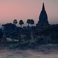 Buy canvas prints of Mysterious Stupas In Bagan At Dawn by Chris Lord