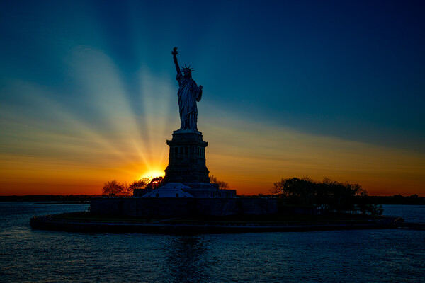 Sunset At The Statue Of Liberty Picture Board by Chris Lord