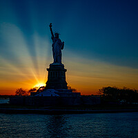 Buy canvas prints of Sunset At The Statue Of Liberty by Chris Lord