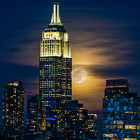 Buy canvas prints of The Worm Moon Rising Over New York City by Chris Lord