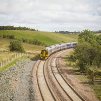 Buy canvas prints of  New Borders Train going through Borthwick by Lynne Morris (Lswpp)