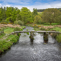 Buy canvas prints of medieval clapper bridge at postbridge Dartmoor  by Eddie John