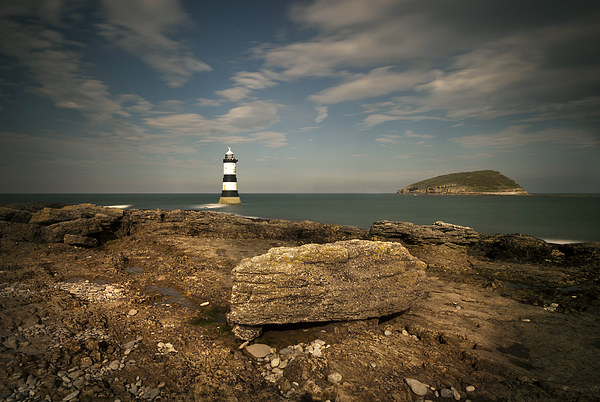 Penmon Point Lighthouse and Puffin Island Picture Board by Eddie John